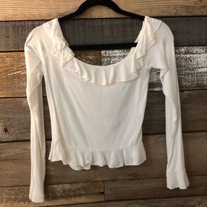 white ruffled top